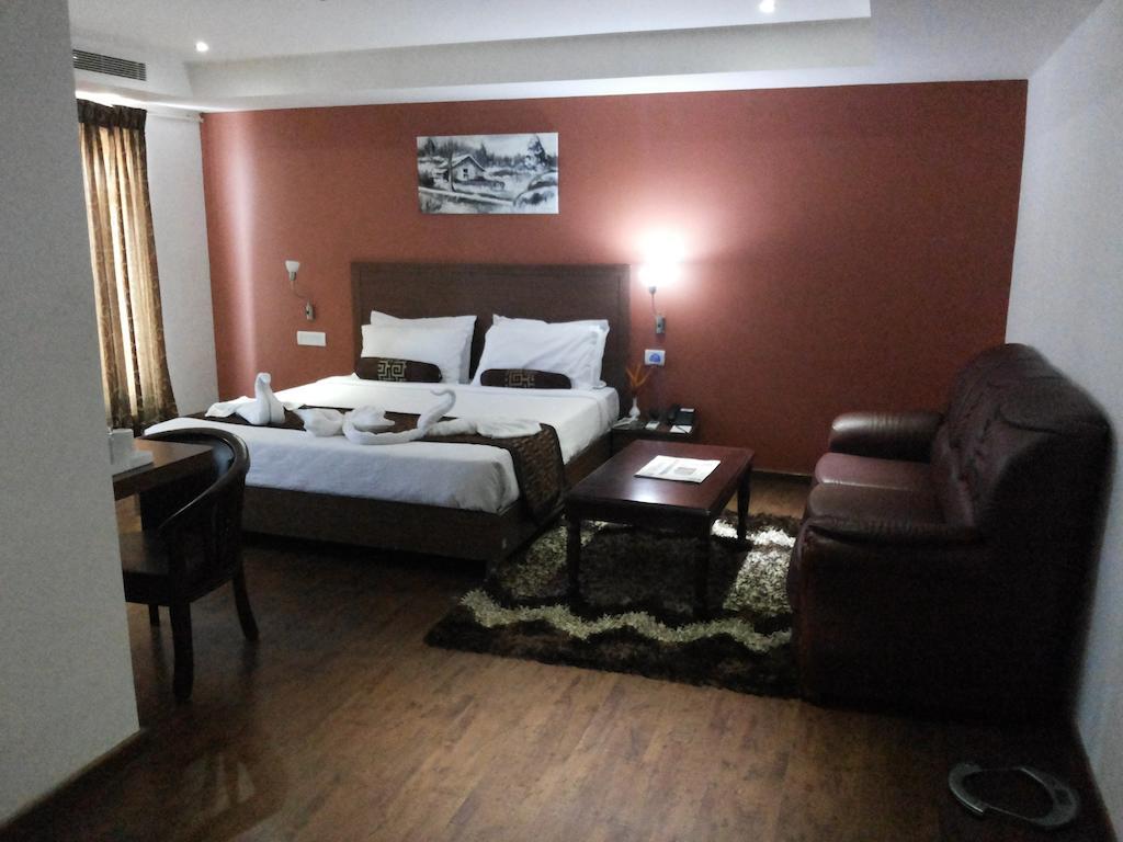 Hotel Milestonnez Sriperumbudur Rom bilde